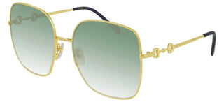 Gucci GG0879S women Gold Geometric Sunglasses